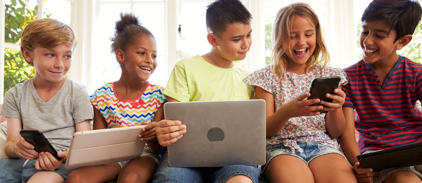 Children on Computers and Tablets - cropped Children on Computers and Tablets