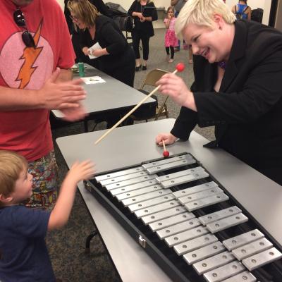 FBSO Director Dominique Royem at the "instrument petting zoo"