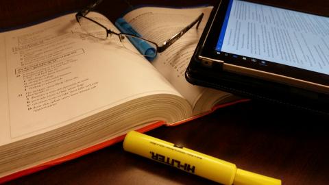 glasses math book highlighters tablet