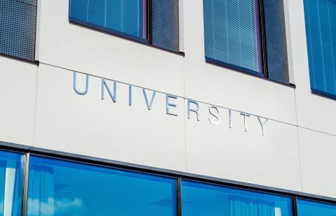 image on building with University spelled on it