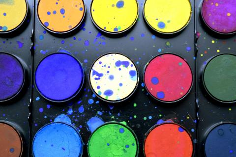 a variety of paint cans
