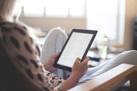 person hlding ereader