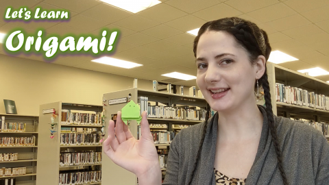 Tabitha holding origami frog
