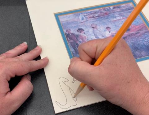 hands drawing with a pencil