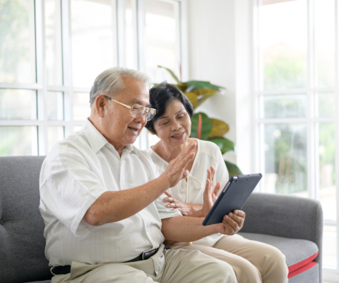 couple performing video call on tablet