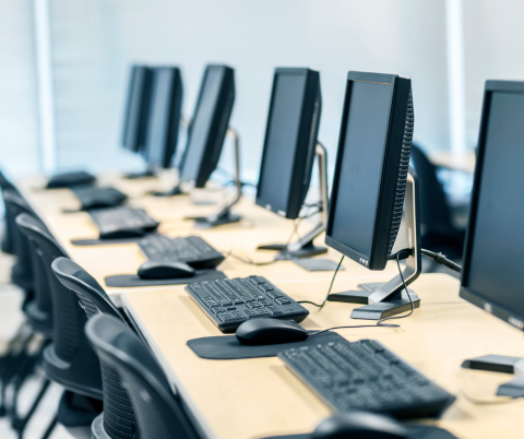 A row of computers in a computer lab