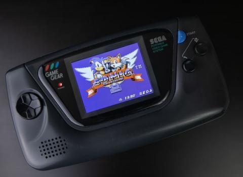 close up of a Sega handheld with the logo of Sonic 2 on the screen