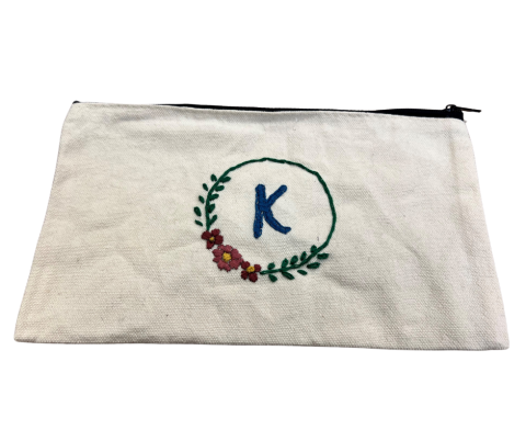 Example of an embroidered zipper pouch.