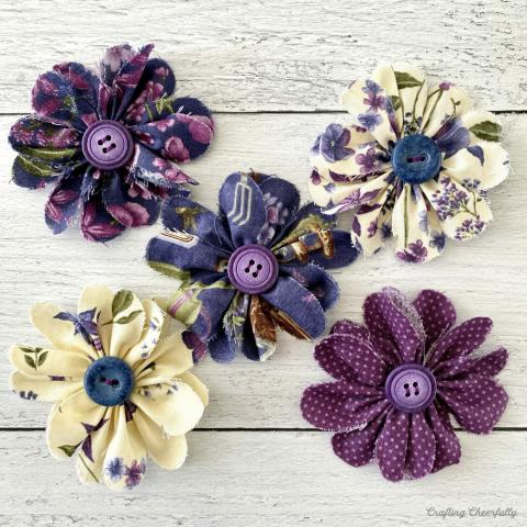 image of flowers made with fabric petals and button centers