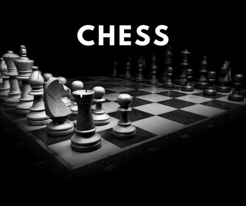 Black and white chess board and pieces