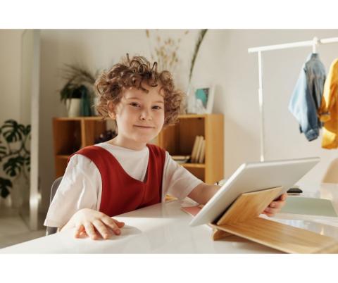 Child reading tablet
