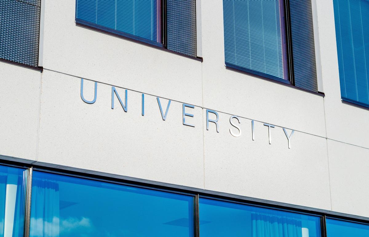 image on building with University spelled on it