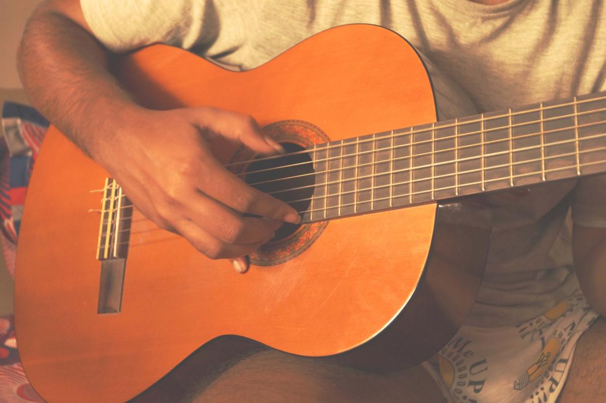 person playing guitar