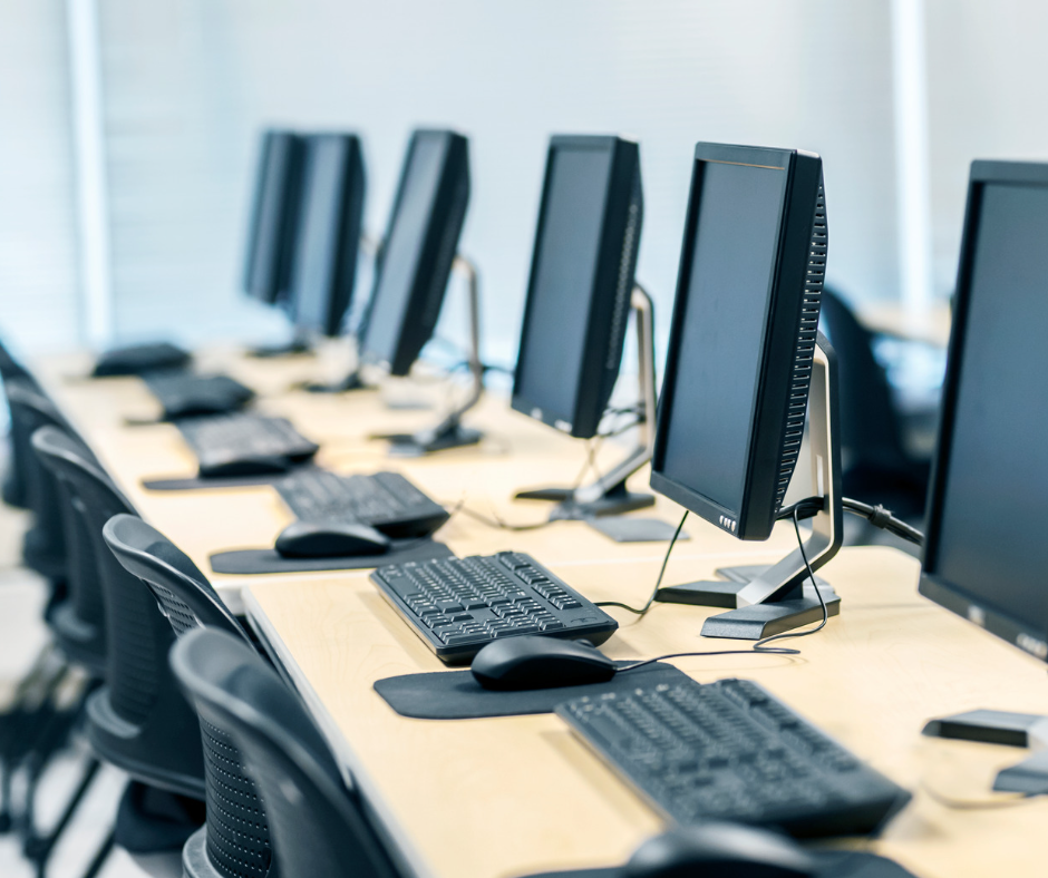 A row of computers in a computer lab